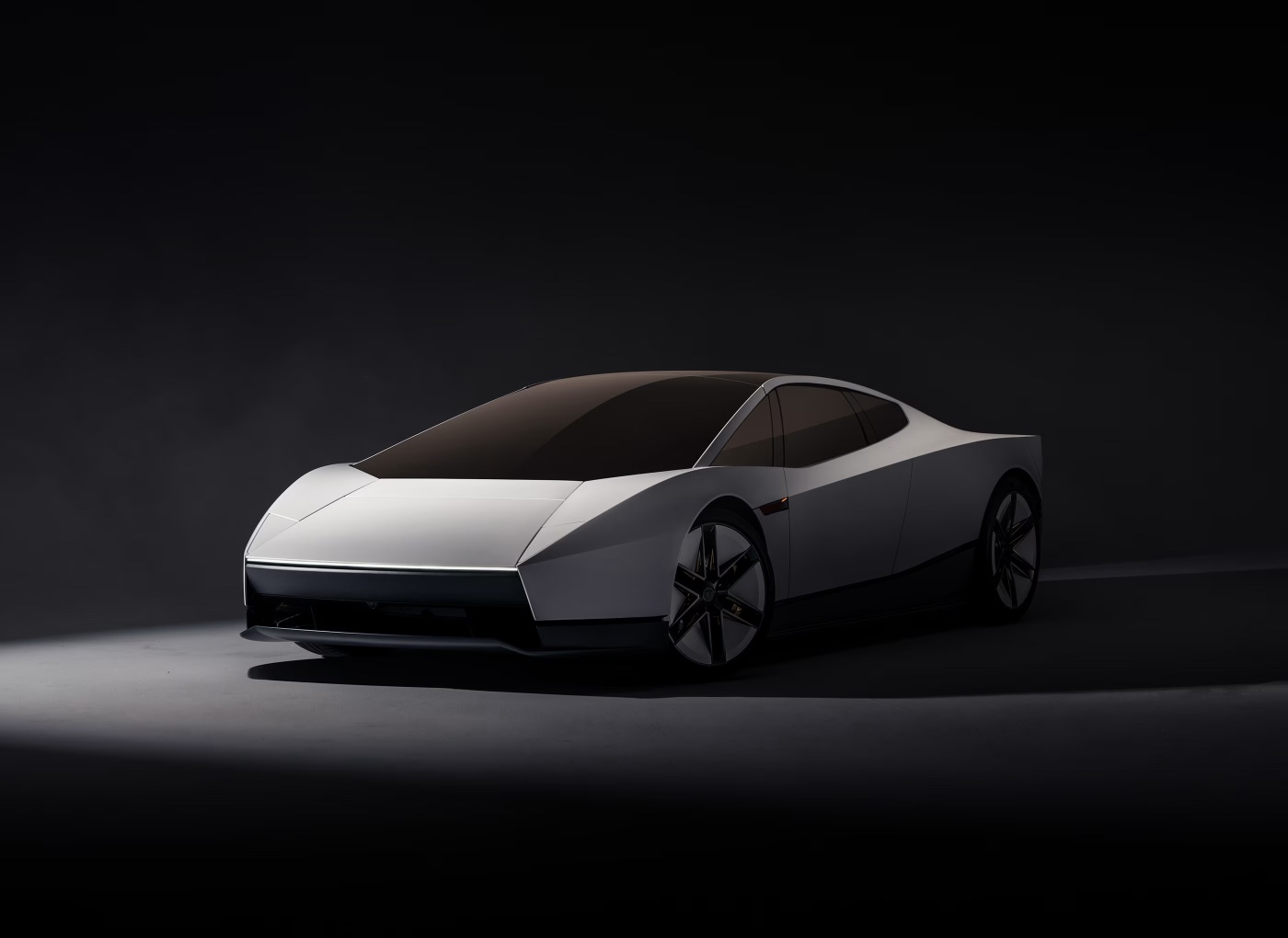 New Tesla Roadster in white from the front three-quarter, with a sharp wedge nose, a thin full-width light line and tinted glass canopy